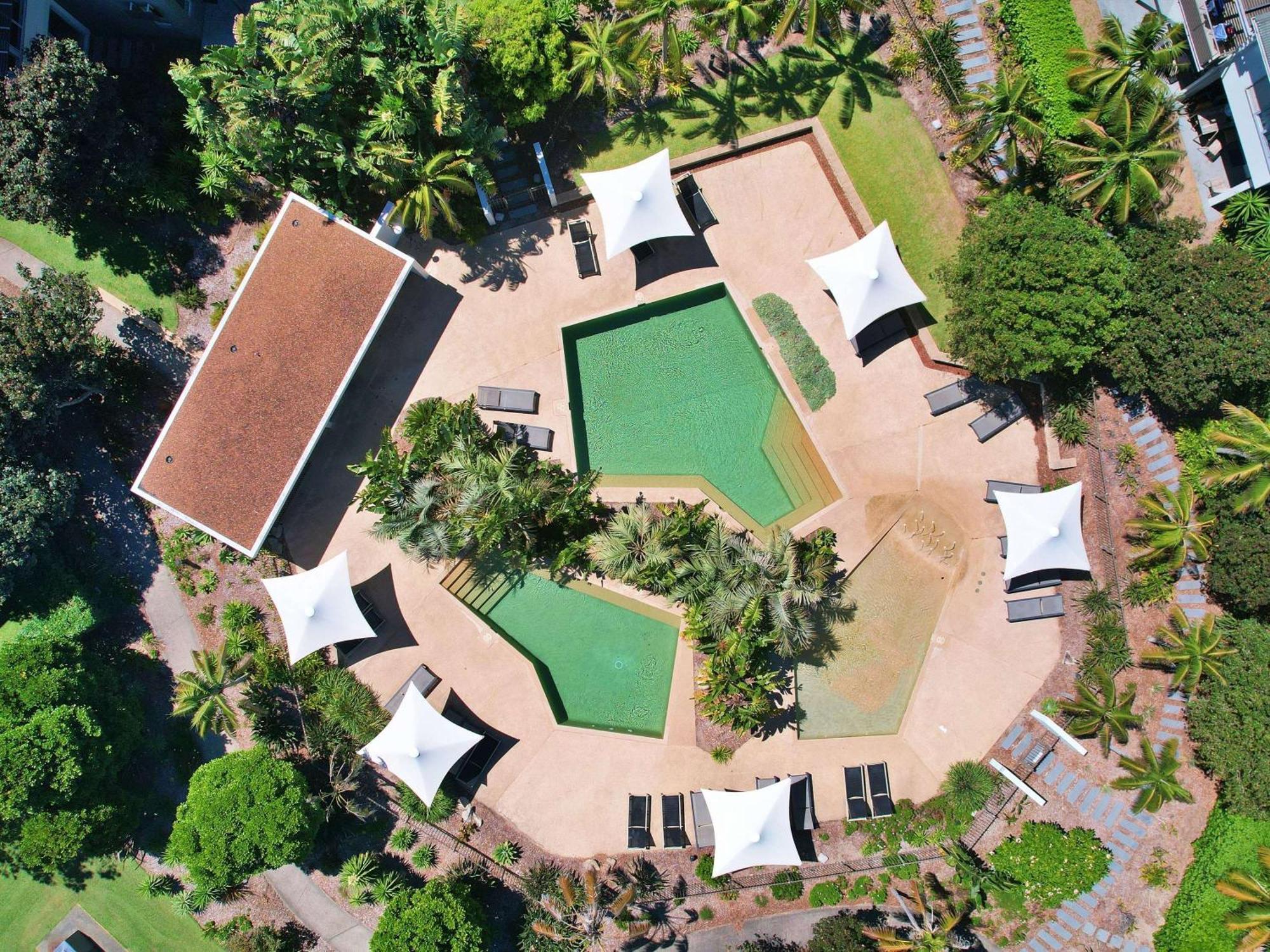 Pullman Magenta Shores Resort Entrance Exterior photo Aerial view of the resort